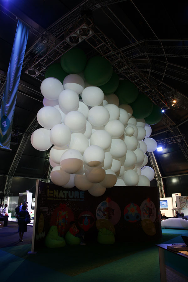 Over 100 exhibitors participate in the Climate Change Response Expo held during the U.N. climate talks in Durban, South Africa. 