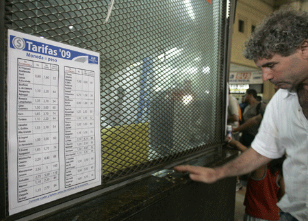People buy tickets in a subway station in Buenos Aires, Argentina, on January 13, 2009.