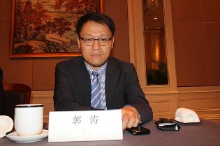 TPG中国区董事兼政府事务总经理郭涛参加世界产业领袖大会。