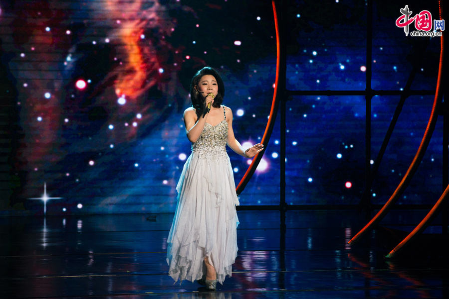 Artists stage a musical 'Love you, Teresa,' in memory of late Chinese pop legend Teresa Teng (1953-1995) in Beijing on Tuesday, June 17, 2014. [Photo by Chen Boyuan / China.org.cn]