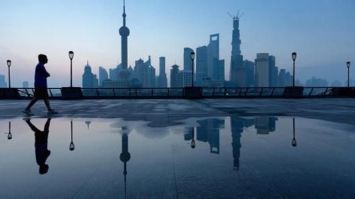 世行预测中国经济增速今年放慢至7.4%_中国发