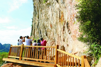 花山岩画申遗成功 填补中国岩画类世界遗产空白