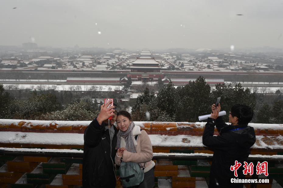 “春雪”袭京城 气温大幅下降