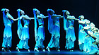 Actors perform a traditional dance of Chinese Uzbek ethnic group during a show to mark the 100th anniversary of the Chinese Xinhai (1911) Revolution in Calgary of Canada, Sept. 8, 2011.