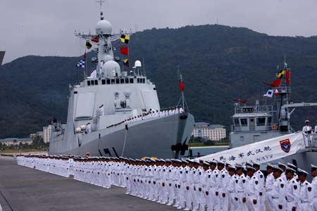 A ceremony is held before a Chinese naval fleet sets sail from a port in Sanya City of China's southernmost island province of Hainan on December 26, 2008. The Chinese naval fleet including two destroyers and a supply ship from the South China Sea Fleet set off on Friday for waters off Somalia for an escort mission against piracy.