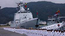 A ceremony is held before a Chinese naval fleet sets sail from a port in Sanya City of China's southernmost island province of Hainan on December 26, 2008. The Chinese naval fleet including two destroyers and a supply ship from the South China Sea Fleet set off on Friday for waters off Somalia for an escort mission against piracy.