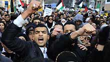 People demonstrate against the Israeli bombardment of the Gaza Strip on January 3, 2009, in Paris. The Israel Defense Forces (IDF) began its ground incursion into the Hamas-controlled Gaza Strip since January 3, and the airstrikes since December 27, 2008 have left at least 450 Palestinian people dead and some 2,300 others wounded in the Gaza Strip by far.