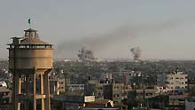 Smokes rise following an Israeli airstrike on an area known to have smuggling tunnels in Rafah, in the southern Gaza Strip on the border with Egypt, on January 3, 2009. The Israel Defense Forces on Saturday evening began its ground incursion into the Hamas-controlled Gaza Strip, vowing to destroy 'terror infrastructure' of Hamas. And more than 450 Palestinians has been killed and some 2,300 wounded during Israeli ongoing intensive airstrikes since December 27, 2008.