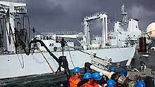 Chinese naval fleet conducts its first at-sea replenishment during the voyage to the Gulf of Aden and waters off Somalia for an escort mission against pirates on Tuesday, on December 29, 2008.