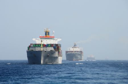 Photo taken from missile destroyer 'Wuhan' of a Chinese naval fleet shows four Chinese ships sailing in the Gulf of Aden under the escort of the Chinese naval fleet, on January 6, 2009. The Chinese naval fleet arrived on Tuesday in the waters of the Gulf of Aden off Somalia to carry out the first escort mission against pirates. Four Chinese ships, including one from China's Hong Kong Special Administrative Region, were escorted by the fleet.