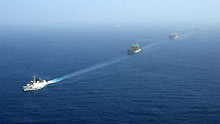 A ship of China Ocean Shipping Group Company (COSCO) sails in the Gulf of Aden under the escort of a Chinese naval fleet (not seen in the picture) on January 6, 2009. The Chinese naval fleet arrived on Tuesday in the waters of the Gulf of Aden off Somalia to carry out the first escort mission against pirates. Four Chinese ships, including one from China's Hong Kong Special Administrative Region, were escorted by the fleet.