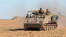 An Israeli armored personnel vehicle march towards the south of the Gaza Strip, on January 6, 2009. Over 540 Palestinians have been killed and some 2,500 others injured in the Gaza Strip during Israel's Operation Cast Lead starting from December 27, 2008.