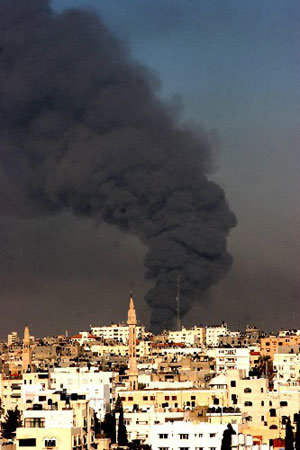 Dense smoke rises from Gaza City after Israeli bombardment on January 8, 2009. 