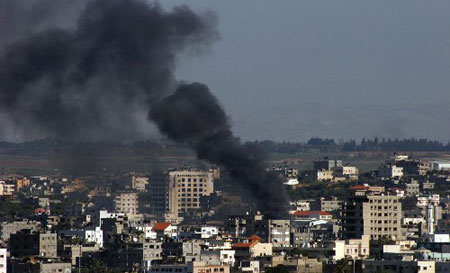 Dense smoke rises from Gaza City after Israeli bombardment on January 8, 2009. 