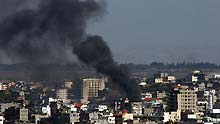 Dense smoke rises from Gaza City after Israeli bombardment on January 8, 2009.