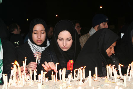 Irani women light candles during a rally at the Palestine Square in Tehran, capital of Iran, on January 7, 2009. Thousands of Irani people gathered at the square Wednesday night to support the Palestinian people.