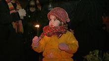 An Irani child holds a candle while praying for the children in Gaza during a rally at the Palestine Square in Tehran, capital of Iran, on January 7, 2009. Thousands of Irani people gathered at the square Wednesday night to support the Palestinian people.