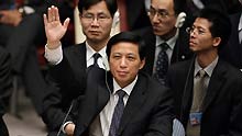 Zhang Yesui, Chinese Permanent Representative to the United Nations, votes for approval of the resolution calling for ceasefire between Israel and Hamas in Gaza during the United Nations Security Council meeting on Gaza crisis at the UN headquarters in New York, the United States, on January 8, 2009.