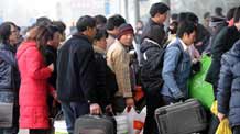 Passengers enter the Nanjing Railway Station in Nanjing, capital of east China's Jiangsu Province, January 8, 2009. During the Spring Festival travel period this year, known as Chunyun in Chinese, more than 6.19 million person-time is expected to depart from Nanjing, over 2.71 million of whom would depart by train, according to the Chunyun Affairs Office of Nanjing on January 1. [Xinhua]