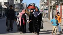 Palestinians flee after Israel's offensive in Gaza, on January 9, 2009.[