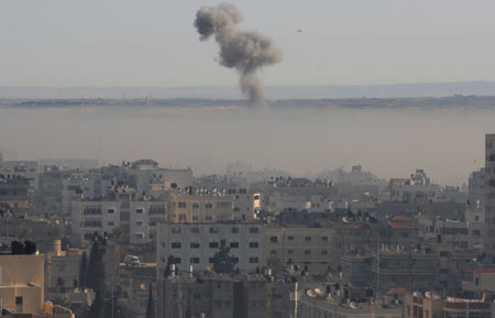 Smoke is seen during an Israeli military operation in Gaza City, on January 15, 2009. At least 30 Palestinians in the Gaza Strip were killed on Thursday until morning hours, as Israeli ground forces pushed deeper into densely populated areas of Gaza City, medical sources and witnesses said. The overall Palestinian death toll in the massive Israeli military offensive 'cast lead' has reached about 1,060, according to the sources.