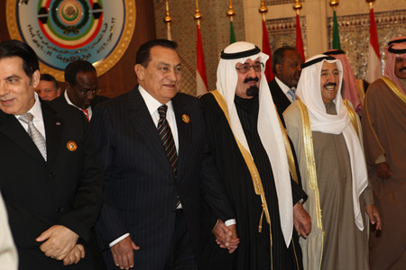 Egyptian President Hosni Mubarak (2nd L, front), King Abdullah of Saudi Arabia (3rd L, front) and Emir of Kuwait Sheikh Sabah al-Ahmad al-Jaber al-Sabah (4th L, front) attend the Arab Economic, Social and Development Summit in Kuwait City, Kuwait, on January 19, 2009. Arab heads of state gathered on Monday for the first Arab economic summit, which is set to tackle the Gaza situation in addition to the impact of global financial crisis, infrastructure and social issues in the Arab world.