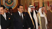 Egyptian President Hosni Mubarak (2nd L, front), King Abdullah of Saudi Arabia (3rd L, front) and Emir of Kuwait Sheikh Sabah al-Ahmad al-Jaber al-Sabah (4th L, front) attend the Arab Economic, Social and Development Summit in Kuwait City, Kuwait, on January 19, 2009. Arab heads of state gathered here on Monday for the first Arab economic summit, which is set to tackle the Gaza situation in addition to the impact of global financial crisis, infrastructure and social issues in the Arab world.