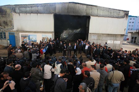 United Nations Secretary-General Ban Ki-moon (C Back) makes a speech during his visit to the damaged UN compound in Gaza City, on January 20, 2009.