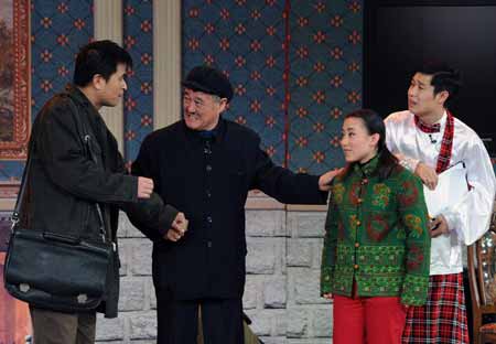 Zhao Benshan (2nd L), China's renowned comic, performs during a dress rehearsal in China's biggest TV station, CCTV, in Beijing, capital of China, on January 17, 2009.