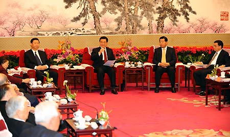 Chinese President Hu Jintao (3rd R), who is also General Secretary of the Communist Party of China (CPC) Central Committee and chairman of the Central Military Commission (CMC), and other Chinese top leaders Jia Qinglin (2nd R), Xi Jinping (4th R) and Li Keqiang (1st R) attend a meeting with representatives of non-communist parties ahead of the Spring Festival in Beijing, capital of China, on January 22, 2009. Hu Jintao delivered an important speech at the meeting, which is presided over by Jia Qinglin.