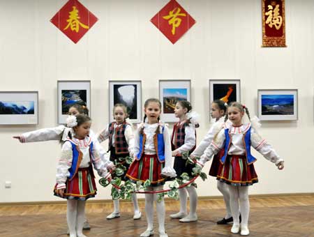 Students perform folk dance in the Historical and Cultural Museum of Belarus in Minsk, the capital of Belarus, on January 22, 2009. Members of the Chinese Embassy in Minsk celebrate Chinese lunar New Year with hundreds of teachers and students of Belarus.