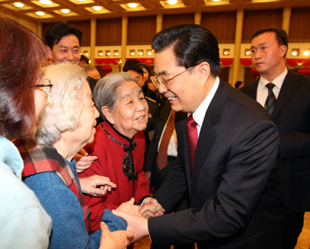 Chinese President Hu Jintao (2nd R) talks to people from all walks of life at a grand gathering held at the Great Hall of the People in Beijing, capital of China, on January 24, 2009. Chinese leaders attended the grand gathering here on Saturday to celebrate the upcoming Spring Festival, or Lunar New Year, and extend festival greetings to the Chinese people.