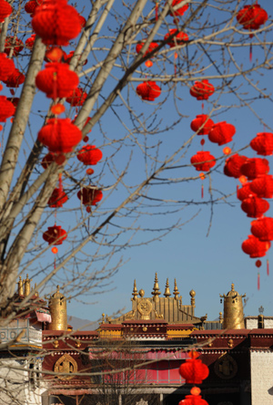 Jokhang Temple is seen among the lanterns which are decorated for the coming Spring Festival in Lhasa, capital of southwest China's Tibet Autonomous Region, on January 24, 2009.