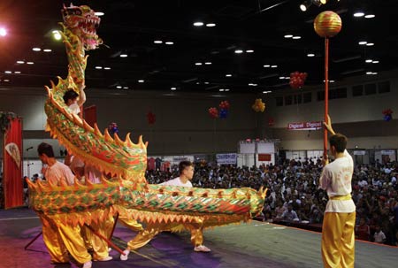 Chinese acrobats perform dragon dance during a ceremony to celebrate Chinese Lunar New Year in Panama City, on January 25, 2009.