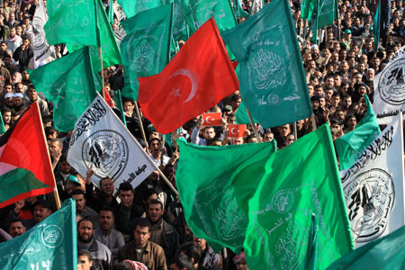 A Turkish national flag (red, center) is seen during a rally held by supporters of Hamas in Gaza City, on January 30, 2009.