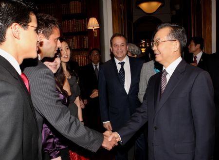 Chinese Premier Wen Jiabao (R) meets with 'Young Icebreakers' from the '48 Group Club' in London on January 31, 2009. Chinese Premier Wen Jiabao arrived in London on January 31 for a three-day visit to Britain.