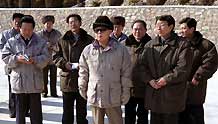Kim Jong Il (C), top leader of the Democratic People's Republic of Korea, inspects the Ryesonggang Youth Power Station No. 1 plant in North Hwanghae province, DPRK, in this undated photo released by Korean Central News Agency (KCNA) on February 1, 2009.
