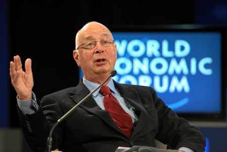 Klaus Schwab, founder and executive chairman of World Economic Forum, gestures during the session 'Believing in the Dignity of All' at the World Economic Forum Annual Meeting 2009 in Davos, Switzerland, on February 1, 2009. The World Economic Forum (WEF) wrapped up its annual meeting here Sunday, with pledges of cooperation from world leaders and elites in tackling the global financial crisis.