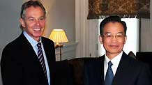 Chinese Premier Wen Jiabao (R) shakes hands with former British Prime Minister Tony Blair during their meeting in London on February 1, 2009. Wen is on a three-day official visit to Britain, the last leg of his week-long European tour.