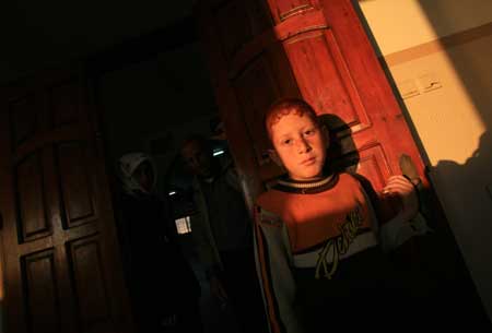 A Palestinian who lost his home during the 22-day Israeli offensive is seen at a United Nations club in al-Shati refugee camp on February 2, 2009.