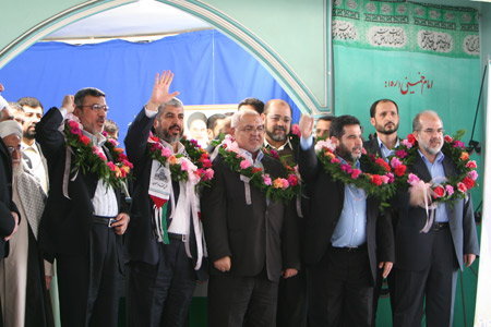 Chief of Hamas political bureau Khaled Meshaal (2nd L in the front) greets audience during a rally in Tehran University on February 2, 2009. A Palestinian Islamic Hamas movement delegation led by Khalid Mashaal arrived in Iran on Sunday.