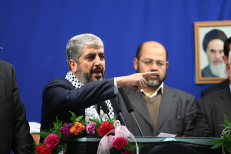 Chief of Hamas political bureau Khaled Meshaal (L) speaks during a rally in Tehran University on February 2, 2009. A Palestinian Islamic Hamas movement delegation led by Khalid Mashaal arrived in Iran on Sunday.