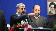 Chief of Hamas political bureau Khaled Meshaal (L) speaks during a rally in Tehran University on February 2, 2009. A Palestinian Islamic Hamas movement delegation led by Khalid Mashaal arrived in Iran on Sunday.