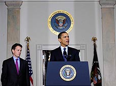 US President Barack Obama (R) delivers remarks about executive compensation as Treasury Secretary Timothy Geithner looks on at the White House in Washington on February 4, 2009. [Xinhua]