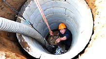 Workers sink a well at Baishu Township in Ruyang County of Luoyang City, central China's Henan Province, on February 4, 2009. The city had received a reduced effective rainfall since October 2008, almost 80 percent less than in the same period of previous years. The local government has allocated some 25 million yuan (US$3.65 million) for drought relief and crops protection.