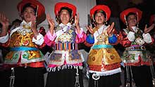 Tibetan residents perform celebrating traditional new year, in Tibetan autonomous prefecture of Diqing, southwest China's Yunnan Province, on February 7, 2009. Tibetans danced and sang celebrating the new year according to the local Tibetan calendar which falls on February 25.