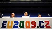 EU Commissioner for Economic and Monetary Affairs Joaquin Almunia (L) answers questions while EU's rotating country Czech's Finance minister Miroslav Kalousek (C) listens during a press conference after the EU Finance ministers meeting in Brussels, capital of Belgium, on February 10, 2009.