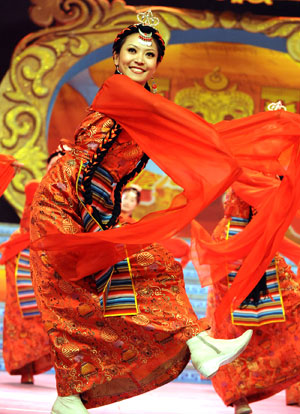 Actresses dance during a dress rehearsal of the evening party held by Lhasa TV station for the upcoming new year of Tibetan calendar which falls on February 25, in Lhasa, capital of southwest China's Tibet Autonomous Region, on February 10, 2009. 