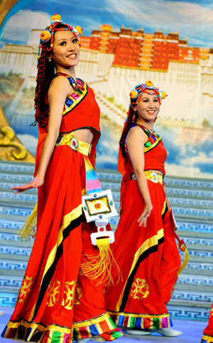 Actresses dance during a dress rehearsal of the evening party held by Lhasa TV station for the upcoming new year of Tibetan calendar which falls on February 25, in Lhasa, capital of southwest China's Tibet Autonomous Region, on February 10, 2009. 