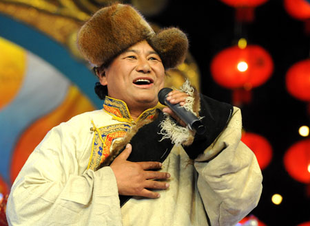 A Tibetan singer performs during a dress rehearsal of the evening party held by Lhasa TV station for the upcoming new year of Tibetan calendar which falls on February 25, in Lhasa, capital of southwest China's Tibet Autonomous Region, on February 10, 2009.